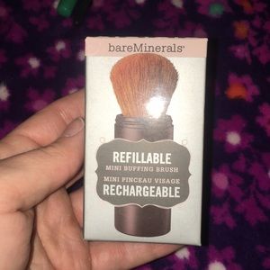 Refillable brush